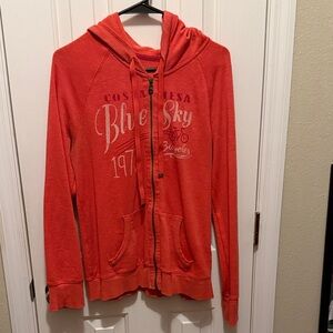 Orange Zip-Up Hoodie with Graphic Print